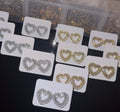 Gold heart stud earrings