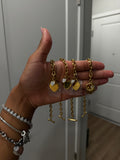 Gold charm bracelet