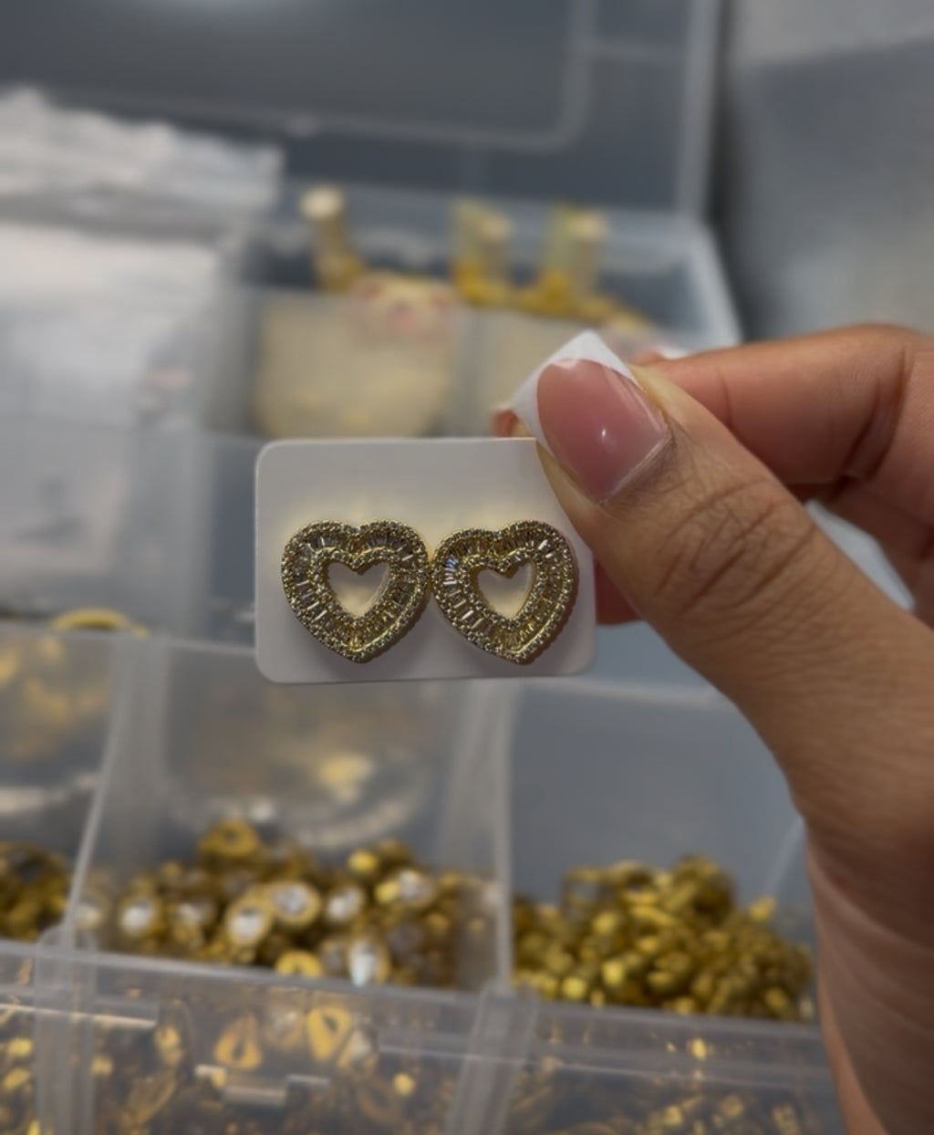 Gold heart stud earrings